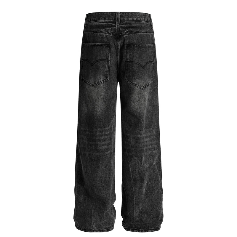 Black wide-leg jeans back view with two back pockets and washed denim texture