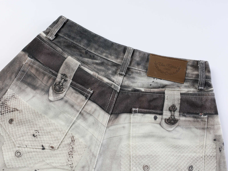 Back waistband close-up with brown leather logo patch and printed pockets