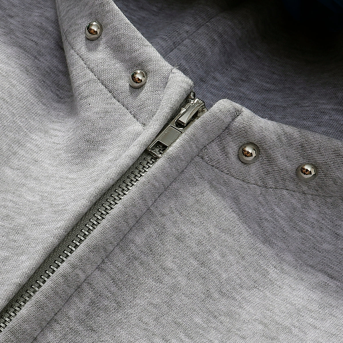 Omirad Studded Arc Zip Hoodie | Metal Stud Detail Streetwear