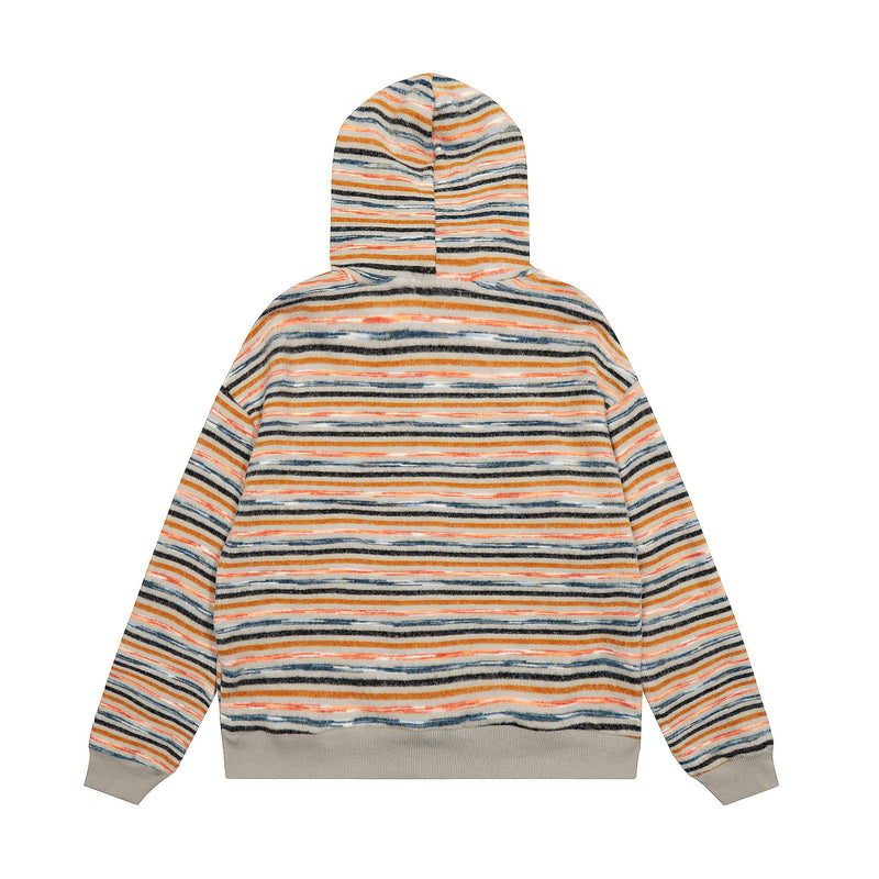 Back view of striped knit zip hoodie in orange, blue, and black with cream ribbed hem