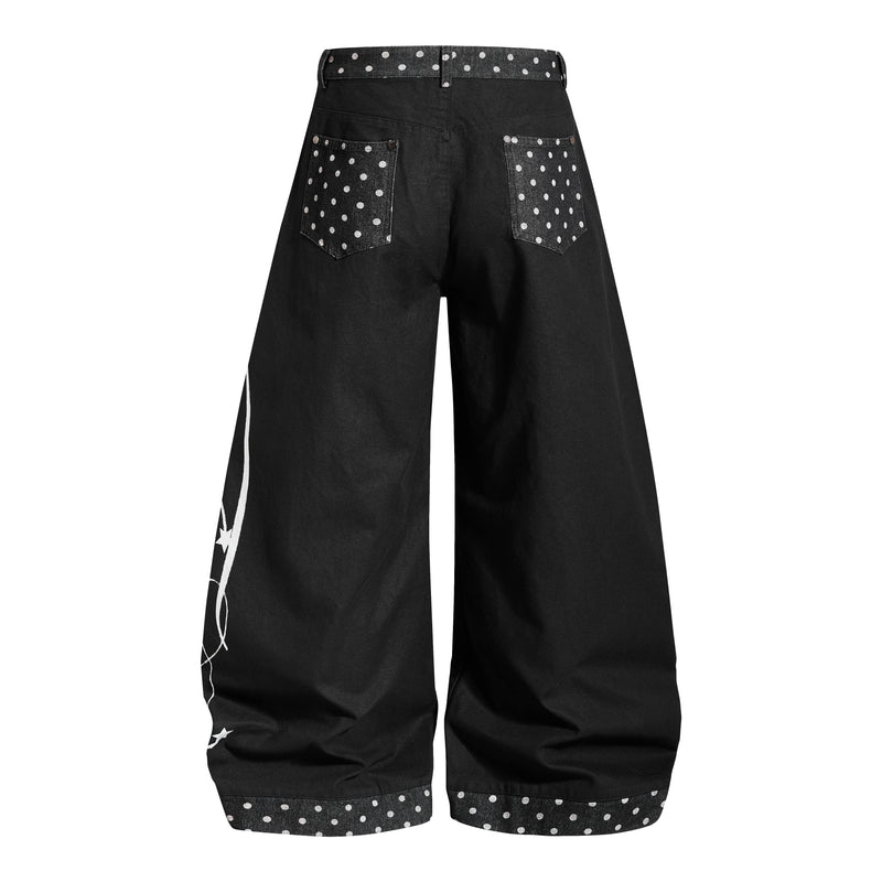 Black wide-leg denim jeans with polka dot back pockets and waistband, back view