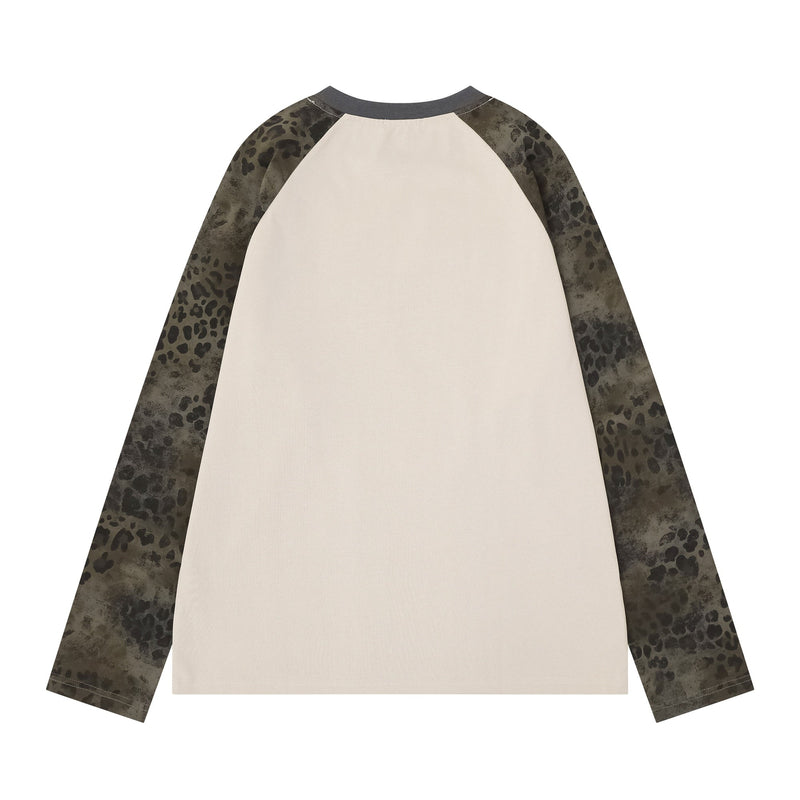Back view of cream raglan long sleeve tee with dark gray collar and leopard print sleeves