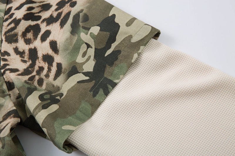 Camo short sleeve over cream textured long sleeve at the cuff