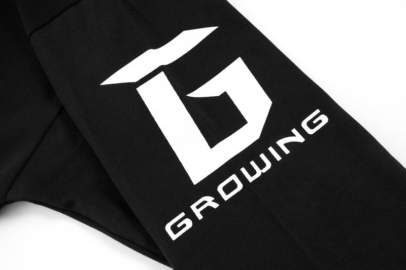Sleeve close-up showing white logo print and black fabric on the hockey jersey