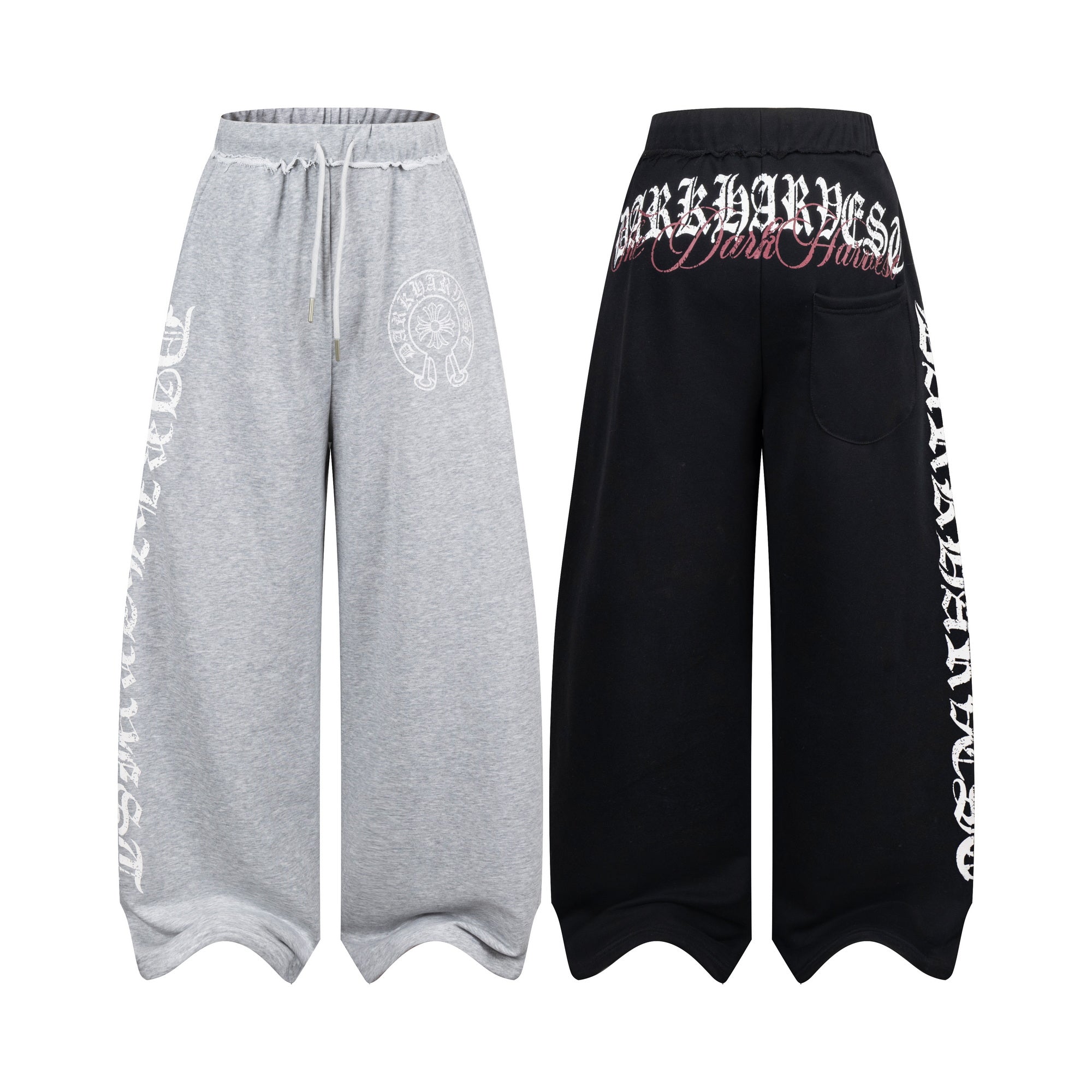 Heather grey wide-leg gothic sweatpants with white oversized lettering and wave-cut hem, front view