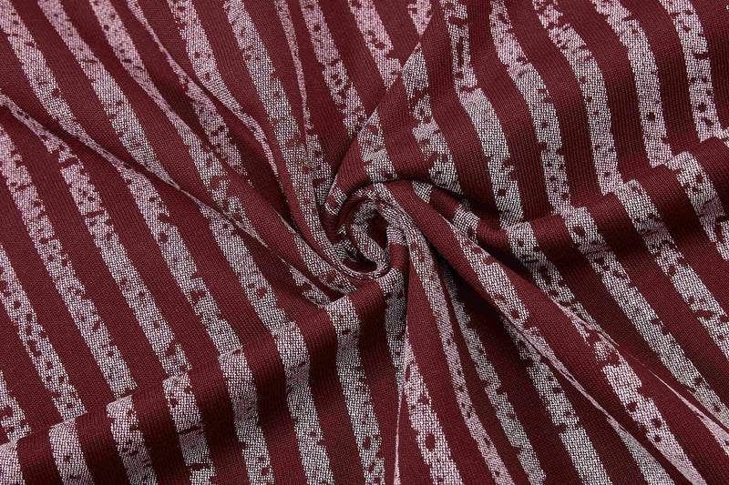 Maroon striped knit sport tee fabric with white vertical graphic lines and textured folds