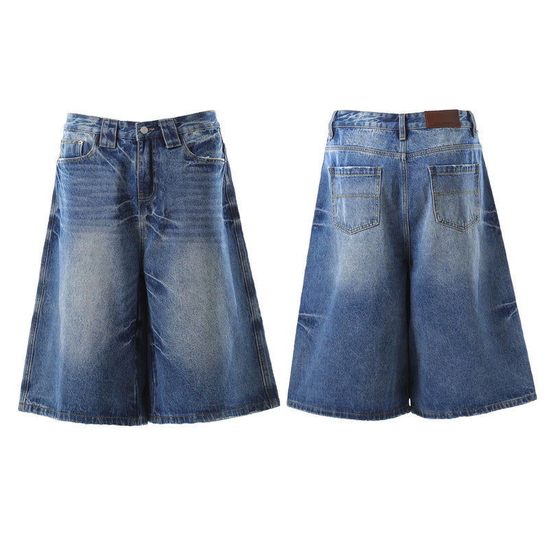 Front and back views of dark wash wide-leg denim shorts with vintage fading