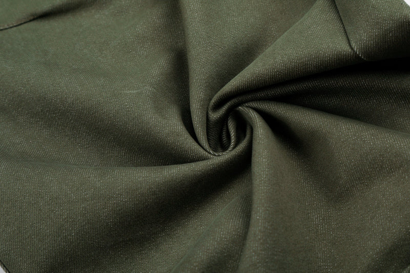 Close-up of army green fabric drape with soft folds and twill weave