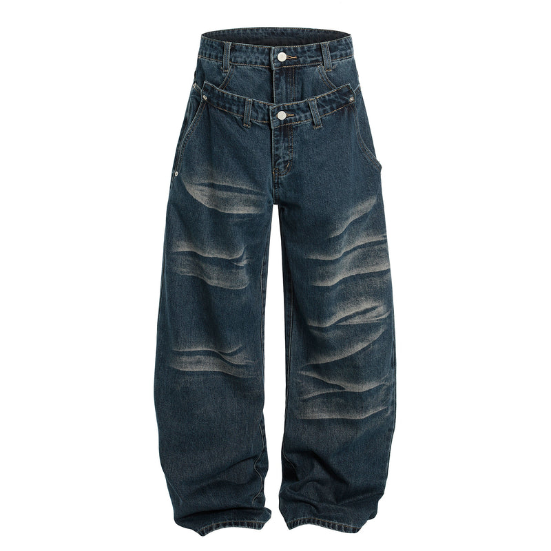 Front view of dark wash wide-leg jeans with double-button waistband and whisker fade details