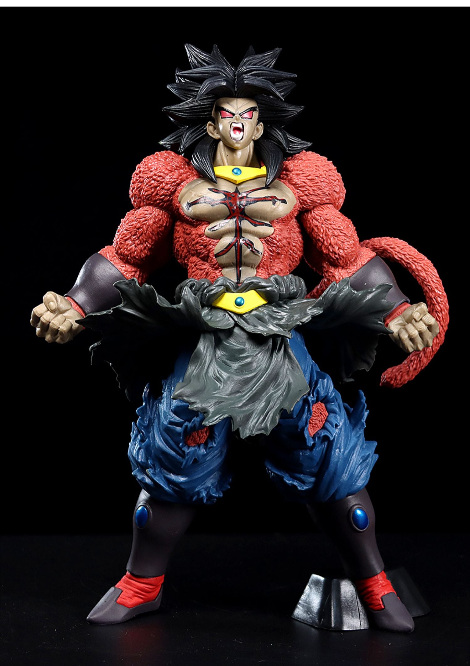 The Super Saiyan Broly Collectible Figure by Seakoff is a 33cm Dragon Ball Z action figure featuring spiky black hair, a furry red top, blue tattered pants, gray and red boots. Capturing the energy-packed universe, Broly stands in an aggressive pose with clenched fists and a swaying tail.