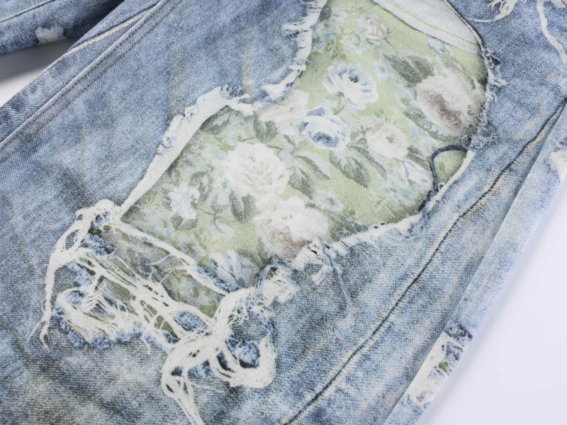 Close-up of large floral print patch on wide-leg denim