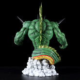 The Seakoff Shenron Broly Collectible Figure from Dragon Ball Z is a 37cm premium action figure featuring a muscular green creature with scales, spiked shoulders, and a long tail atop a cloud-like base. The back view highlights its detailed textures and vibrant colors against a black background.