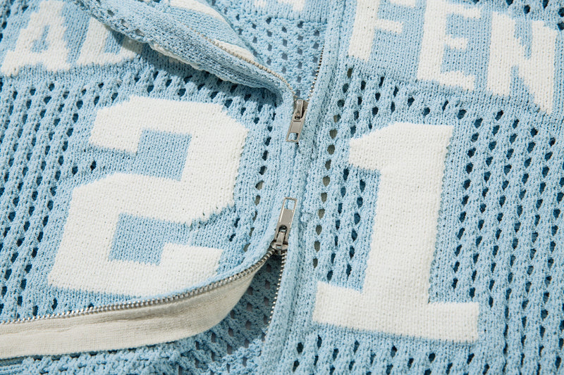 Close-up of light blue front zipper on mesh knit jacket with large number print