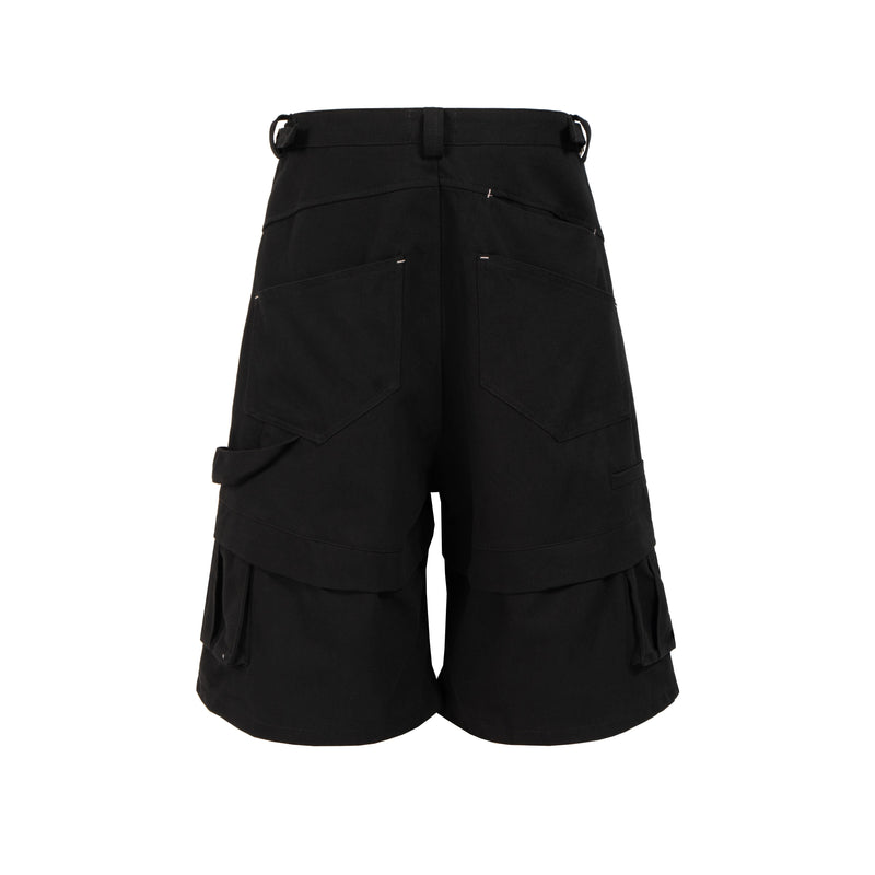 Black cargo shorts with back pockets and layered hems, back view