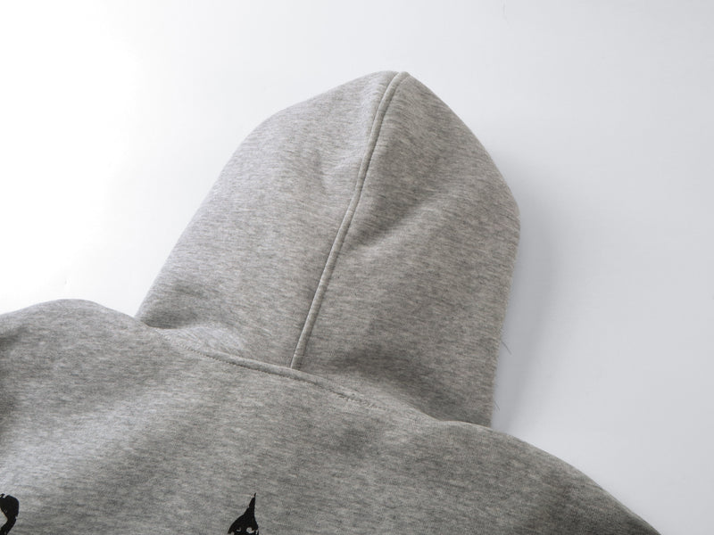 Close-up of gray hood with center seam and heathered knit texture