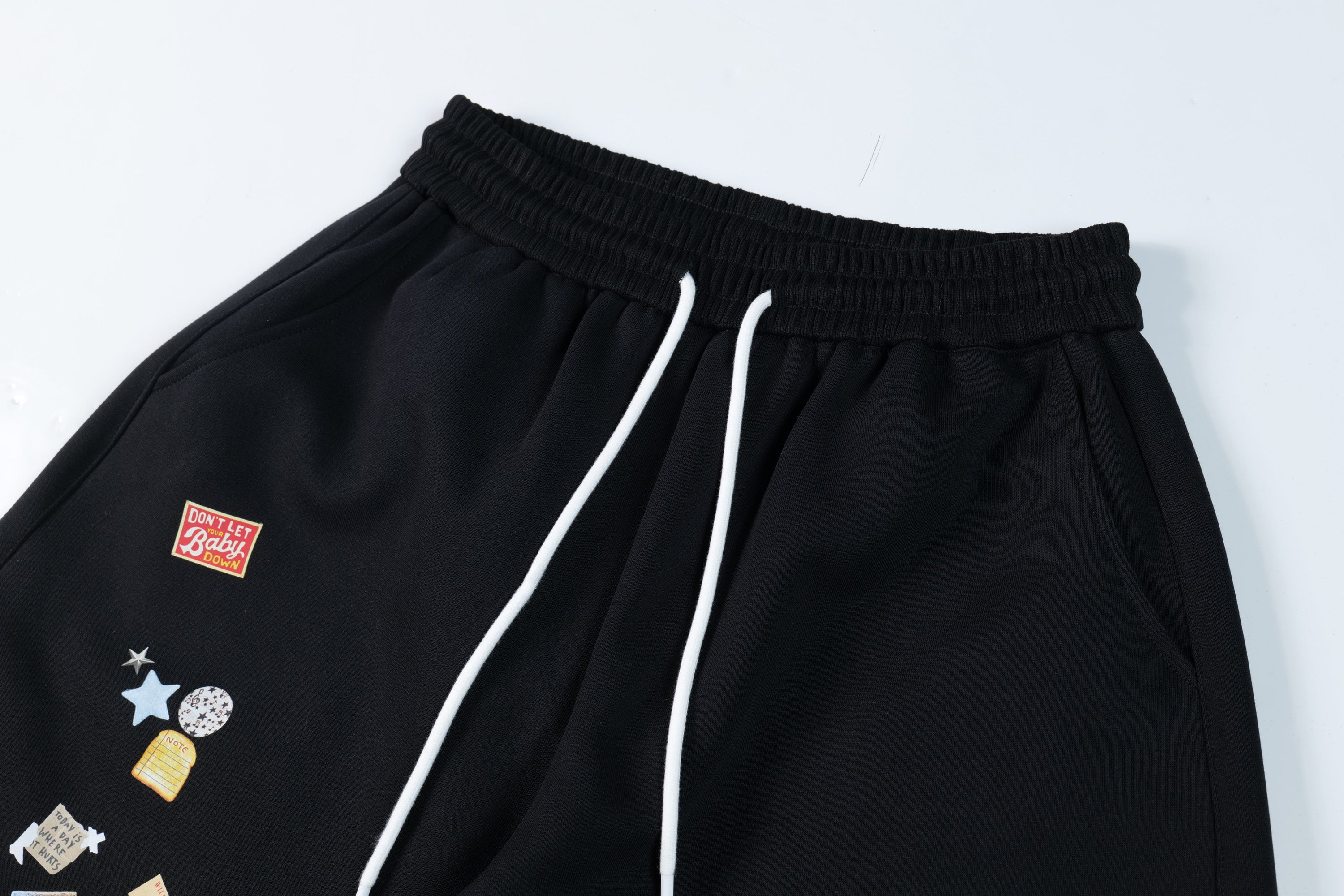 Omirad Patch Graphic Track Pants | Wide-Leg Streetwear