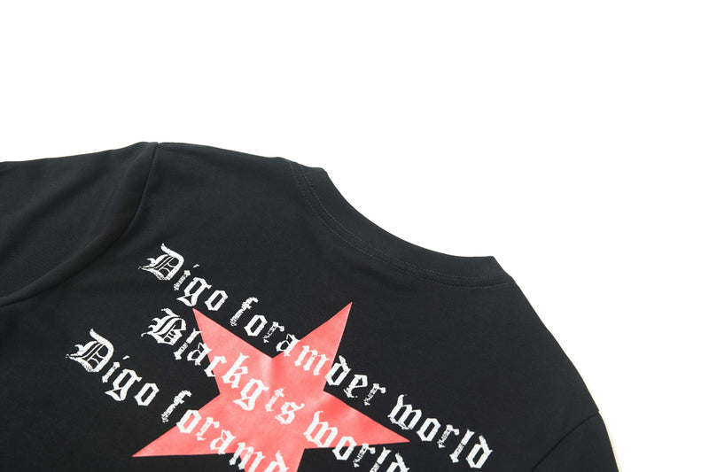 Black cotton graphic tee with a red star emblem and distressed white gothic lettering across the chest