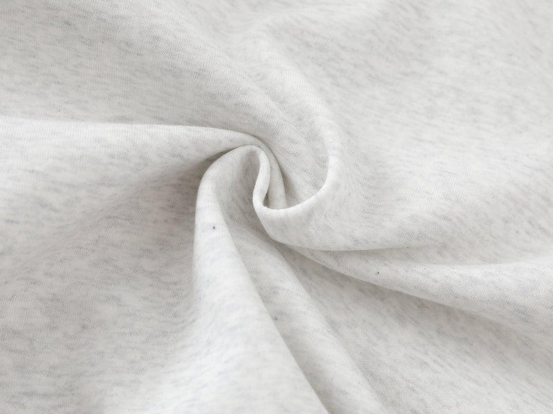 Close-up of light gray hoodie fabric texture with soft heathered knit