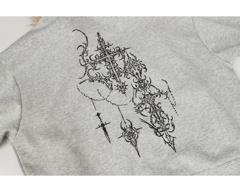 Close-up of light gray hoodie back showing ornate black medieval-style graphic print