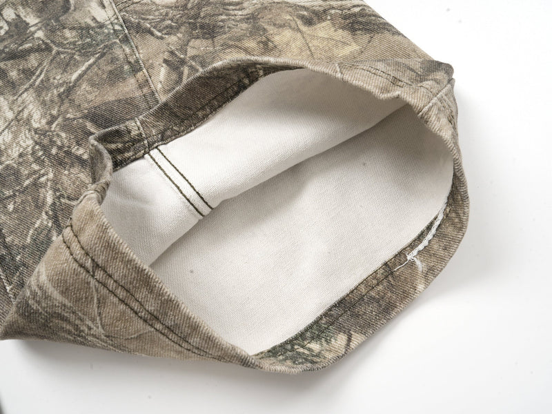 Close-up of rolled pant cuff with white inner lining