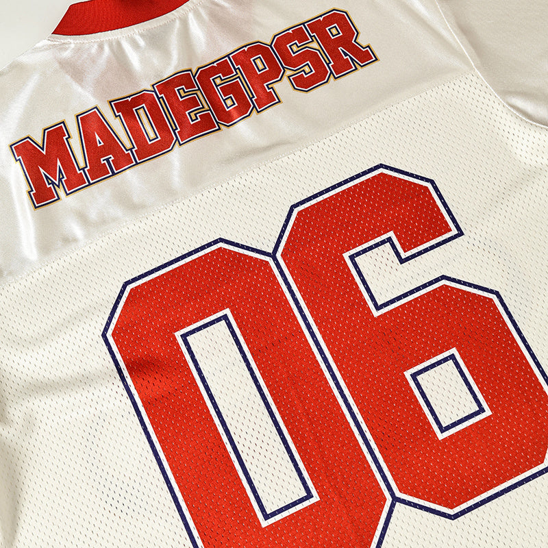White and red mesh football jersey with MADESPSR lettering and large number 06 on the back