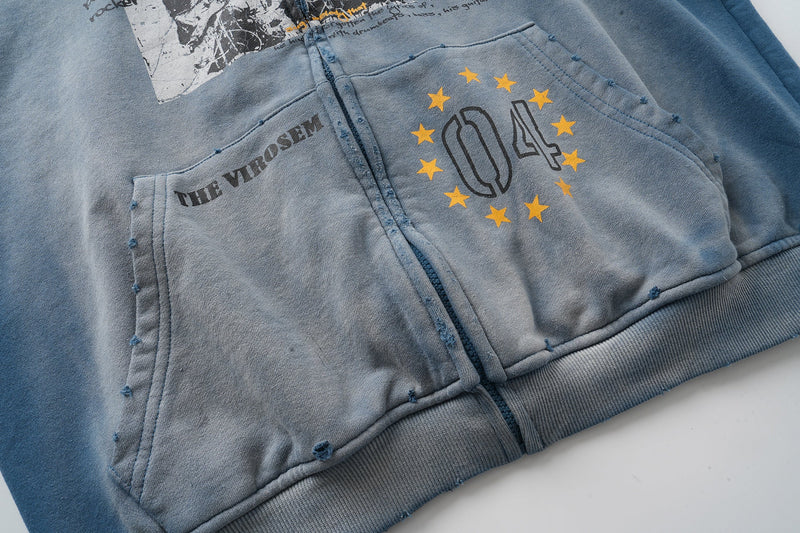 Close-up of front pocket and 04 star print on the zip-up hoodie