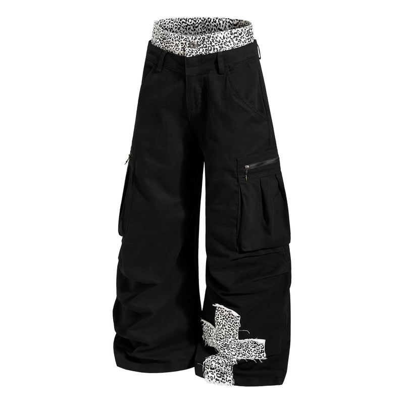 Black wide-leg cargo pants with leopard-print waistband, angled front view with side zip pockets