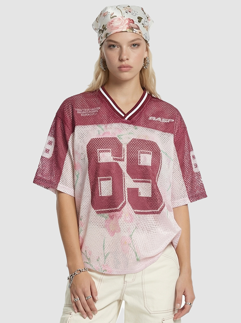 Women’s floral mesh jersey T-shirt with maroon 69 graphic, V-neck trim, and relaxed streetwear fit