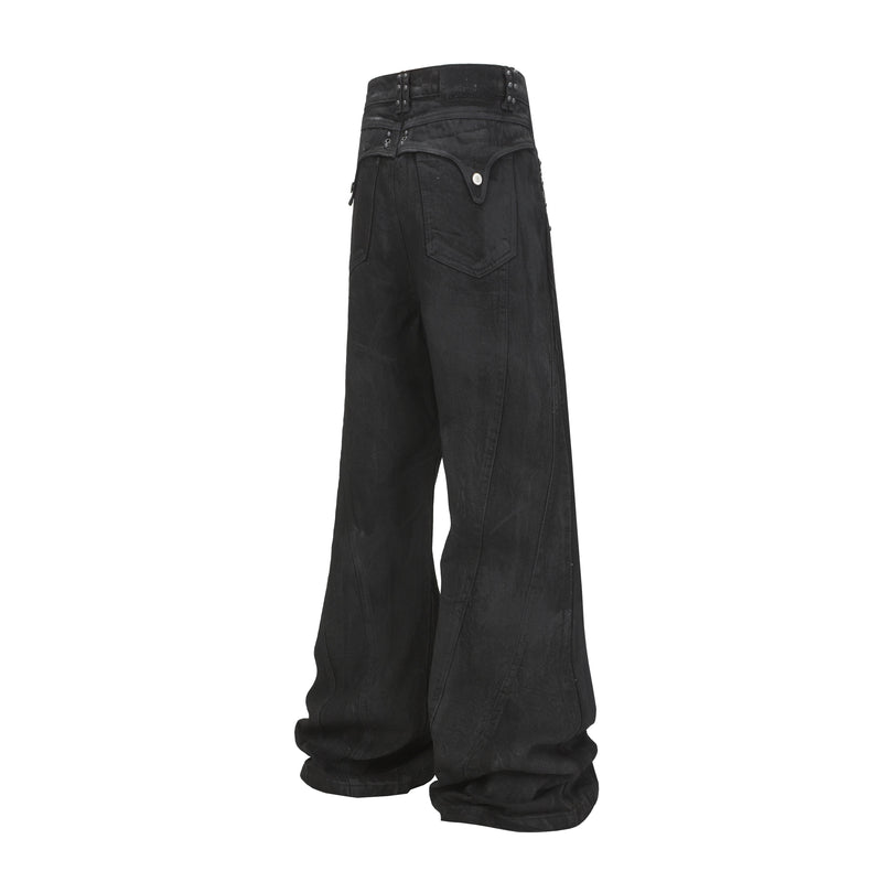 Back view of black wide-leg jeans with studded waistband panels and rear pockets