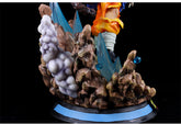 Close-up of the Seakoff Goku Collectible Figure – Dragon Ball Z Kamehameha Statue showcases rugged brown rock formations with translucent blue spikes. A white cloud effect enhances the dynamic scene, with part of an orange and blue costume visible above.