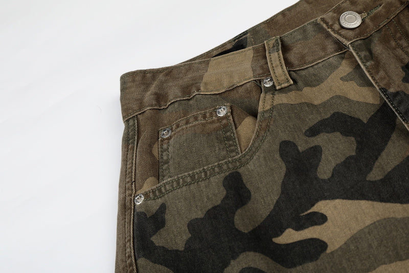 Close-up of front pocket and waistband on camo cargo jeans