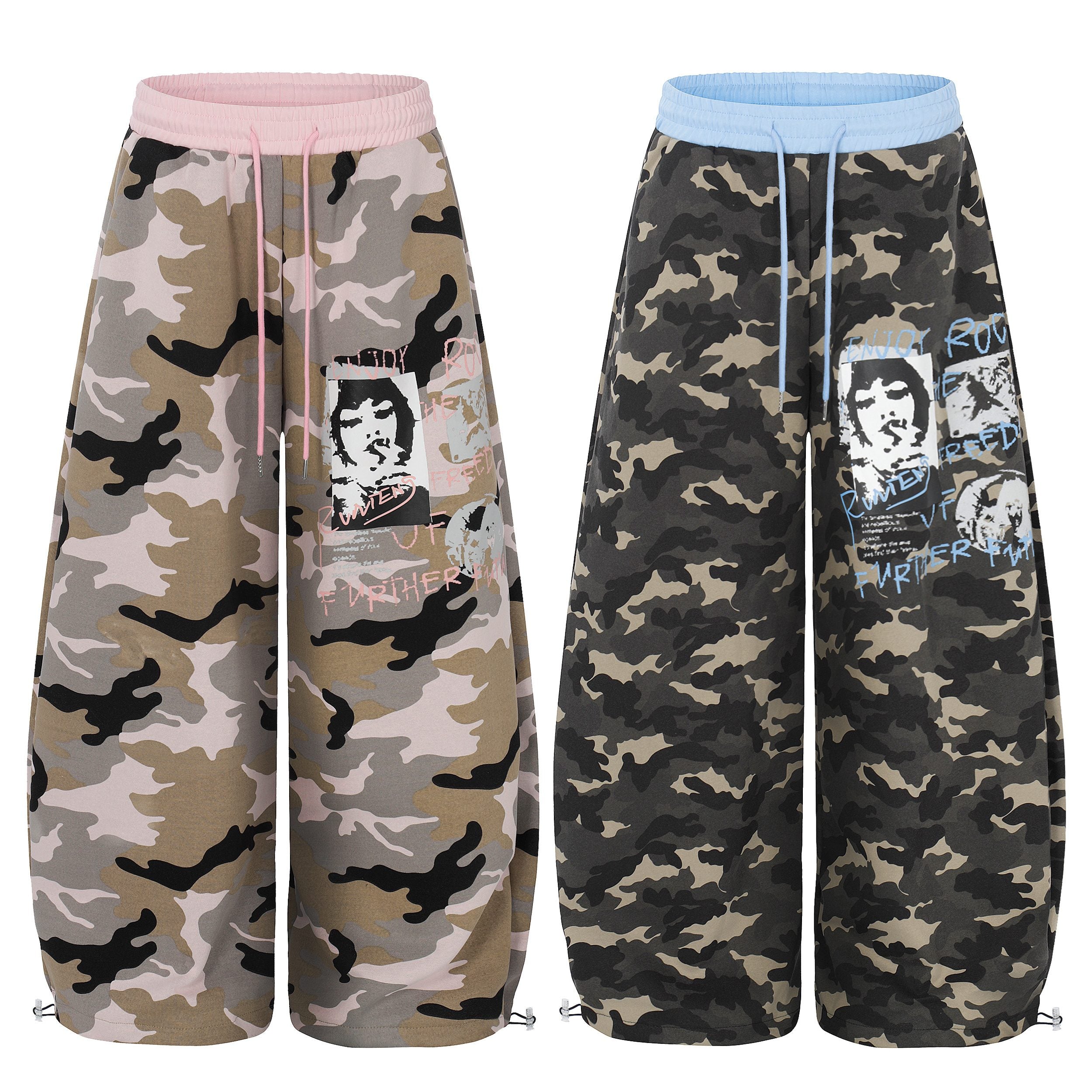 Omirad graphic camo wide-leg sweatpants in pink and blue waistband colorways with poster-style face print
