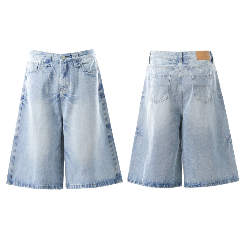 Light wash denim shorts front and back views with A-line wide legs