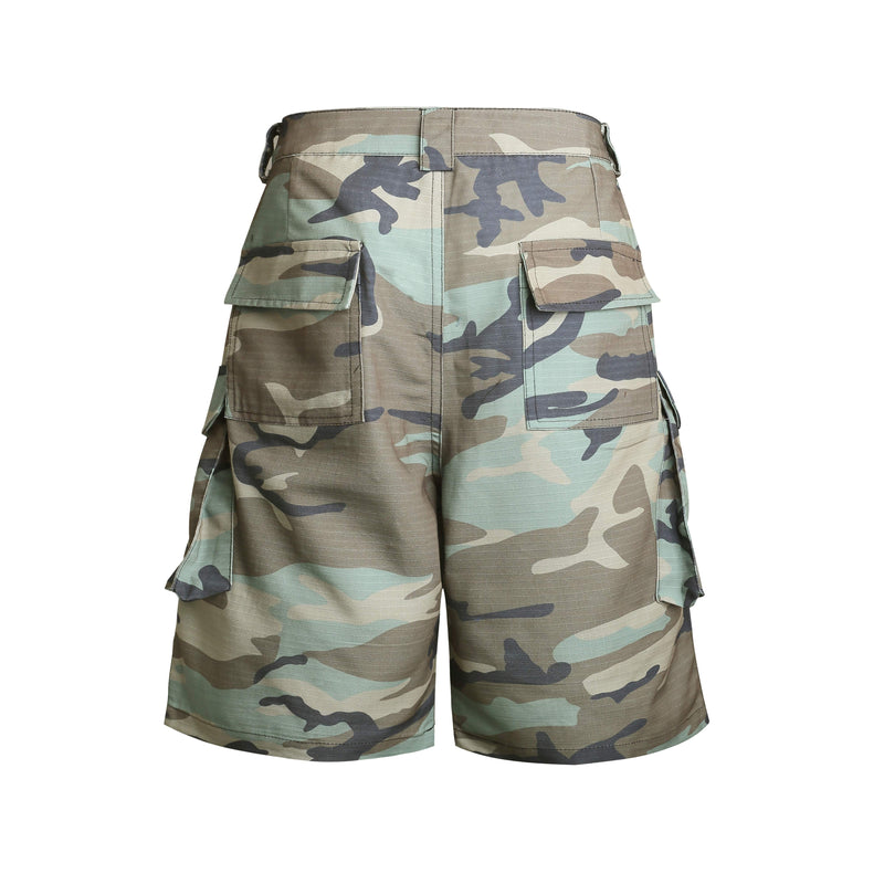 Back view of woodland camo cargo shorts with rear flap pockets and side cargo pockets