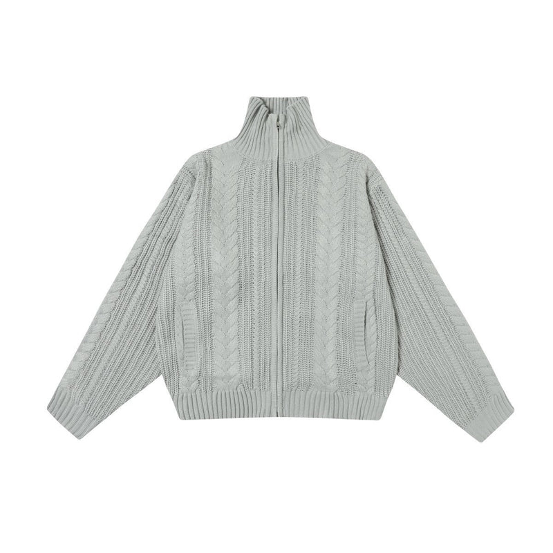 Light gray cable knit zip-up turtleneck sweater, front view with long sleeves