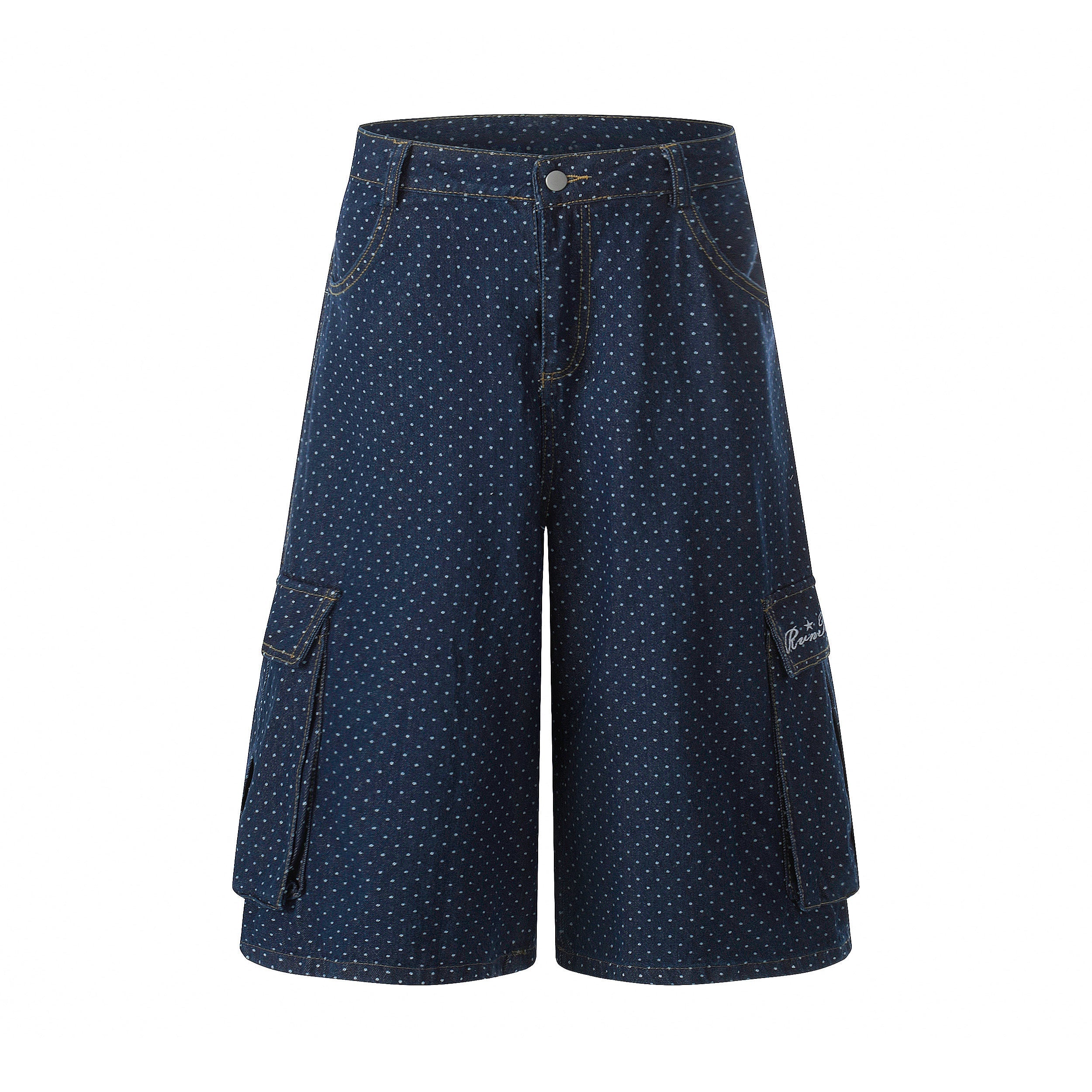 Navy polka dot denim cargo shorts with wide fit, flap cargo pockets, and contrast stitching, front view