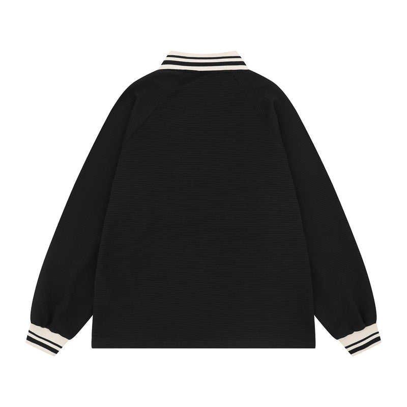 Black long sleeve soccer jersey, back view with striped collar and cuffs