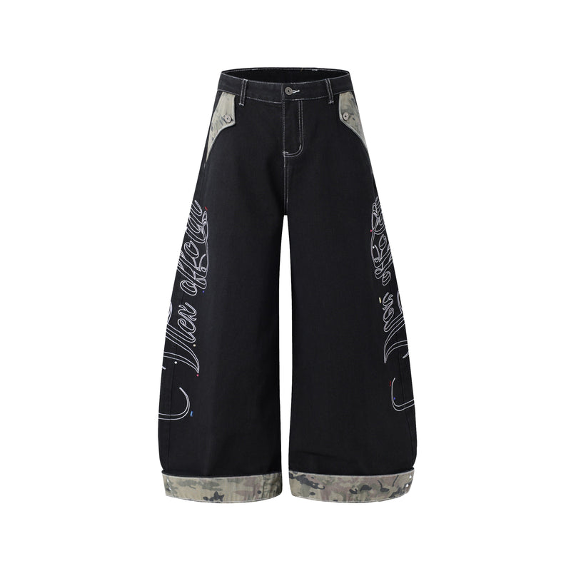 Front view of black wide-leg jeans with camouflage trim at the waist and cuffs