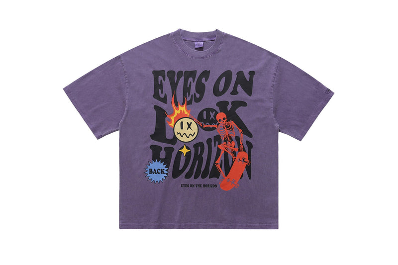 Purple vintage wash graphic tee with eyes on the horizon print, skeleton skater, and bold streetwear text