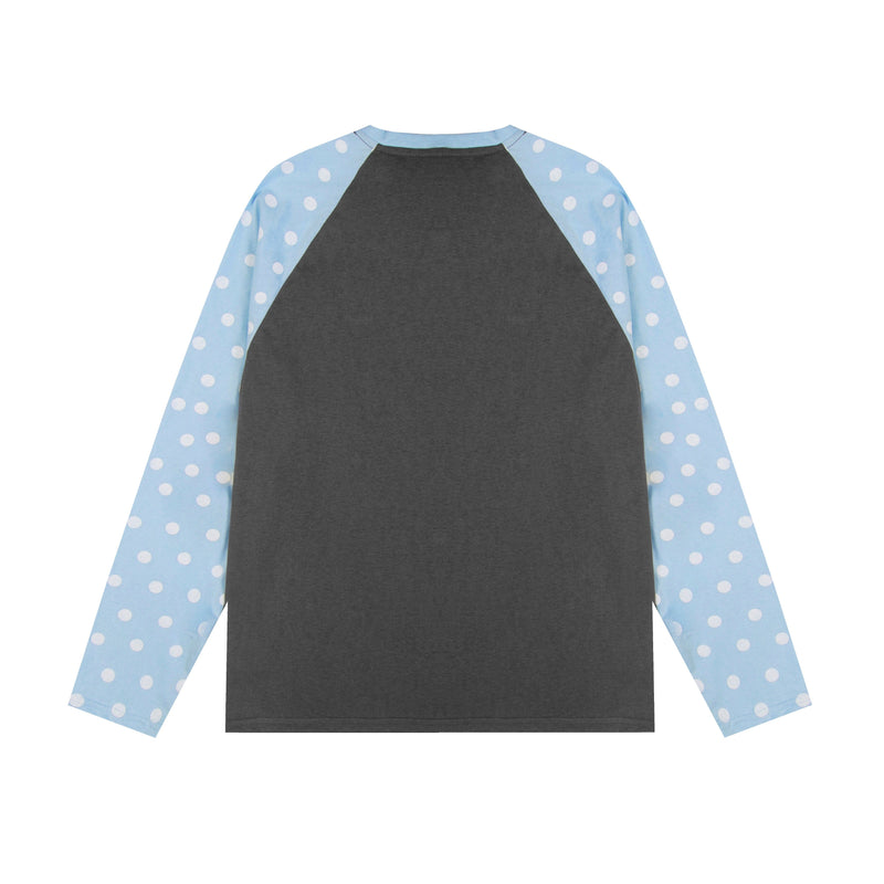Back view of white raglan tee with dark gray body and light blue polka dot sleeves