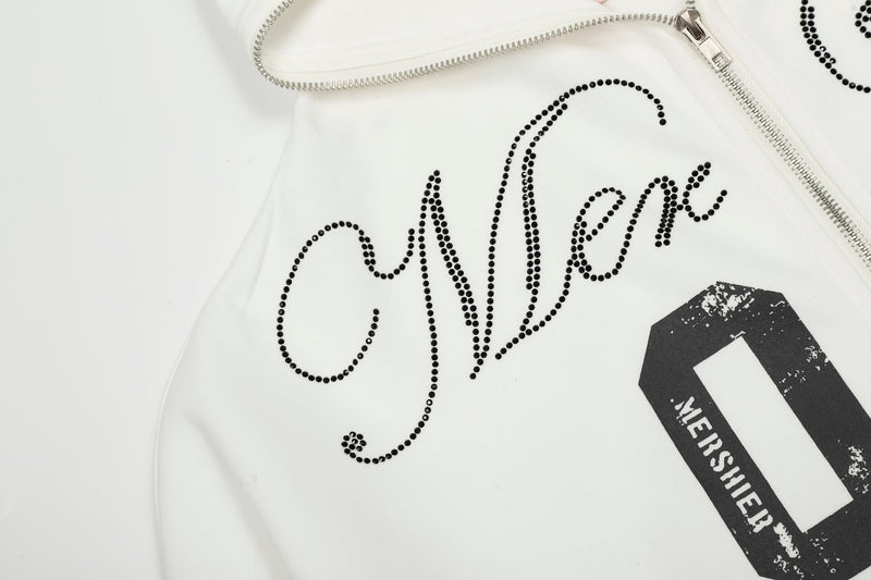 Close-up of front punk script lettering and distressed number print on white hoodie