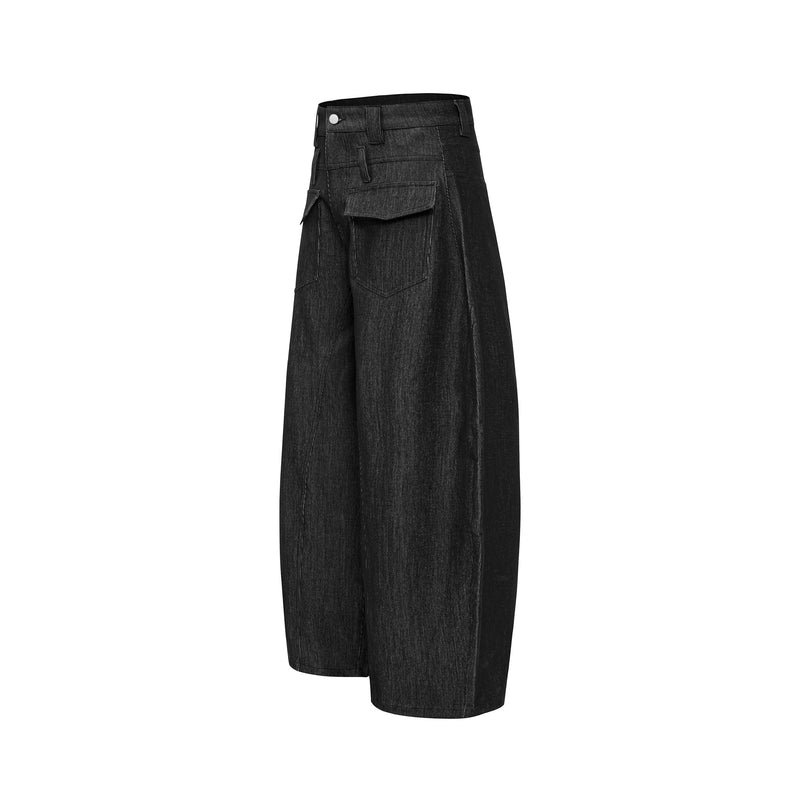 Angled side view of black wide-leg denim pants with flap cargo pocket detail