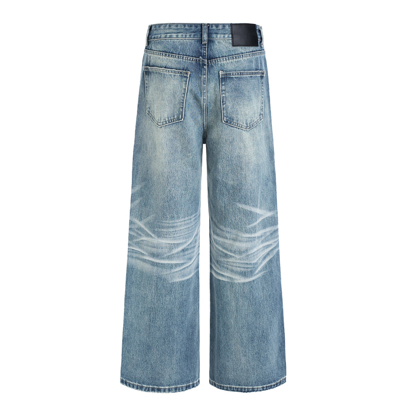 Washed wide-leg blue jeans with back pockets, rear view