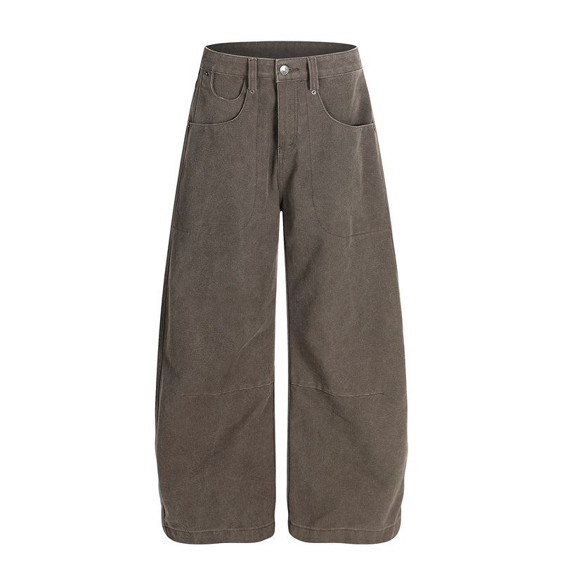 Brown wide-leg workwear pants with front pockets and a high waist