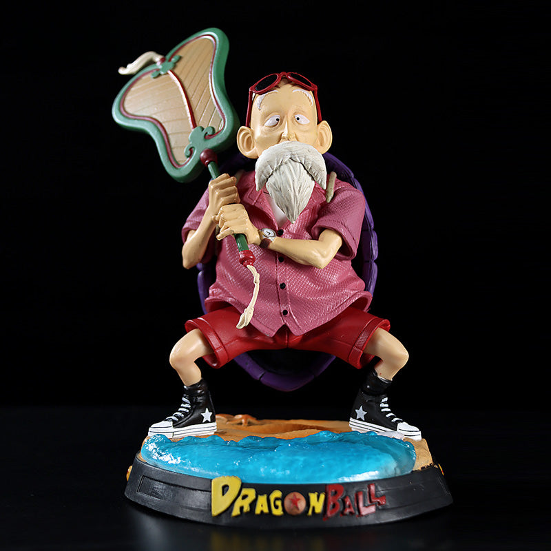 The Master Roshi Collectible Figure by Seakoff, standing 18cm tall, showcases the whimsical charm of the &quot;Dragon Ball&quot; character. This premium action statue features him in a pink shirt, red shorts, sunglasses on his head, and holding a butterfly net with a purple turtle shell on his back.