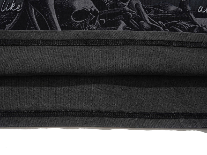 Black gothic graphic tee with layered raw hems and dark skull print fabric detail