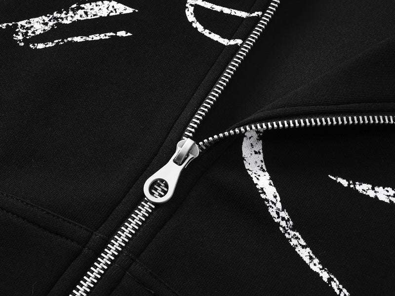 Close-up of front zipper and white print on black hoodie