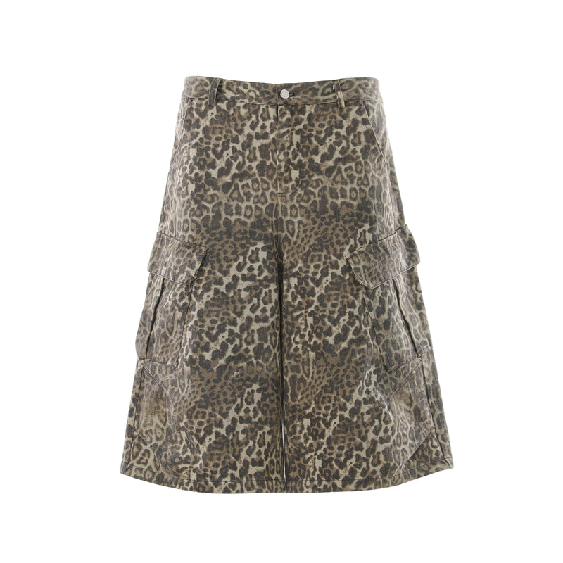 Front view of leopard print cargo shorts with wide legs and flap side pockets