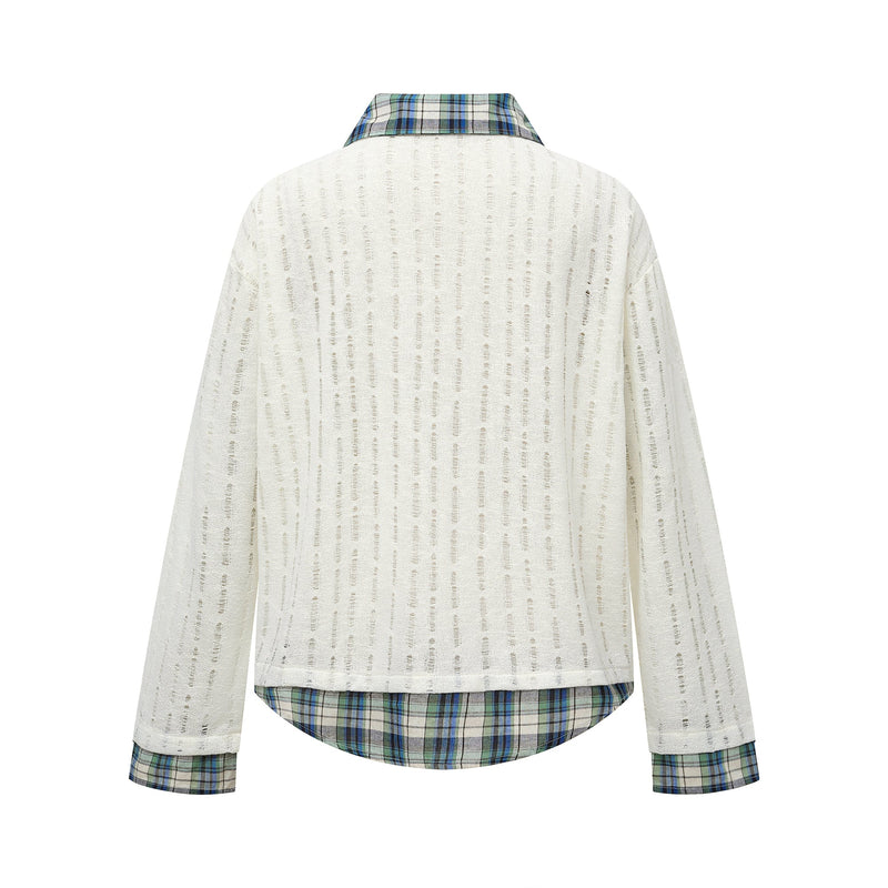Back view of cream distressed long-sleeve shirt with plaid collar, plain back and plaid hem