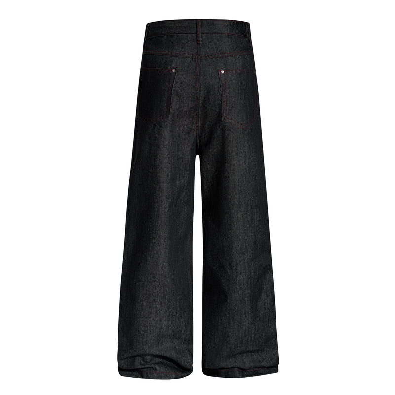 Back view of black wide-leg denim pants with red contrast stitching and rear patch pockets